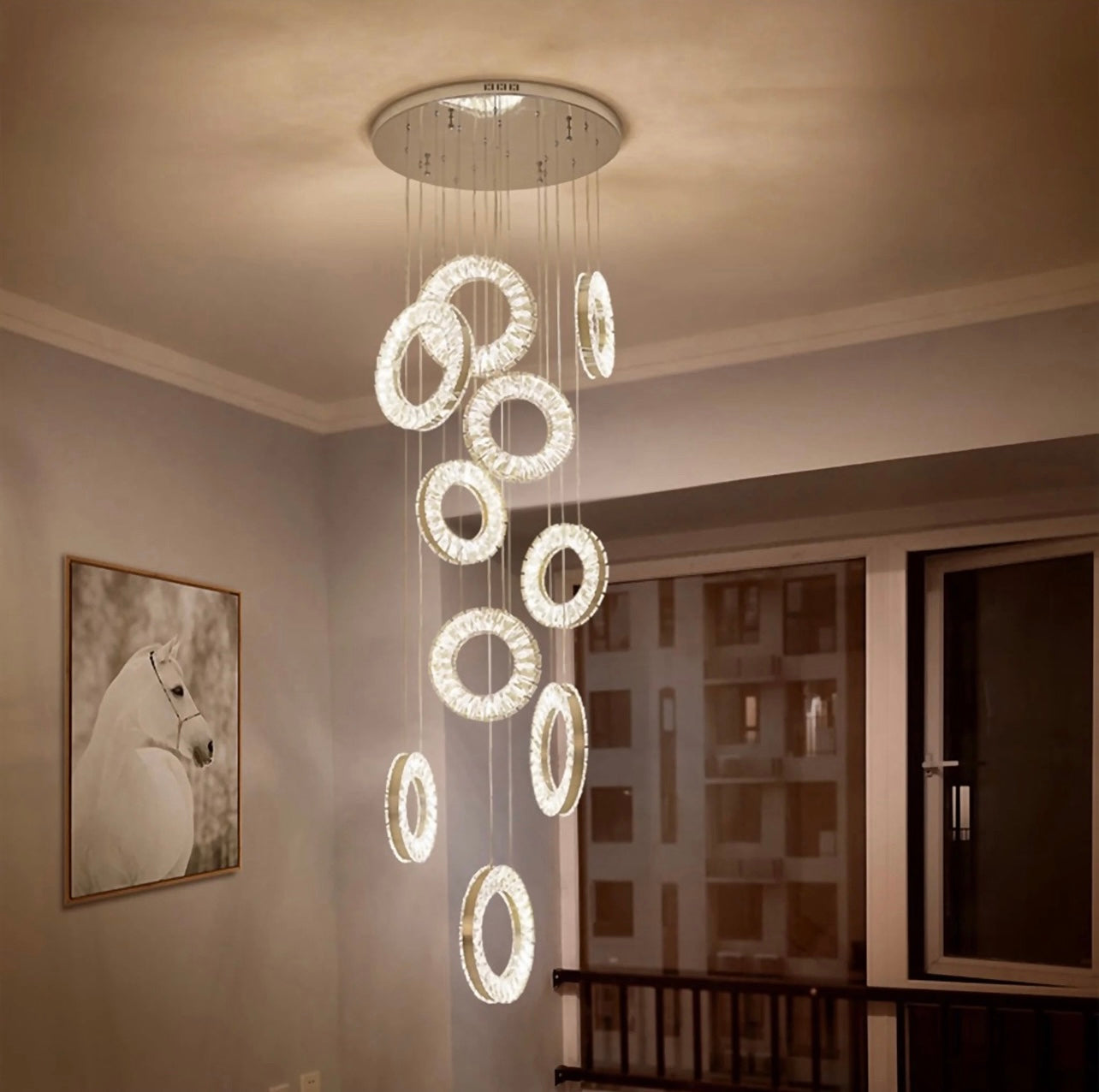 Ring style chandelier for open to above space