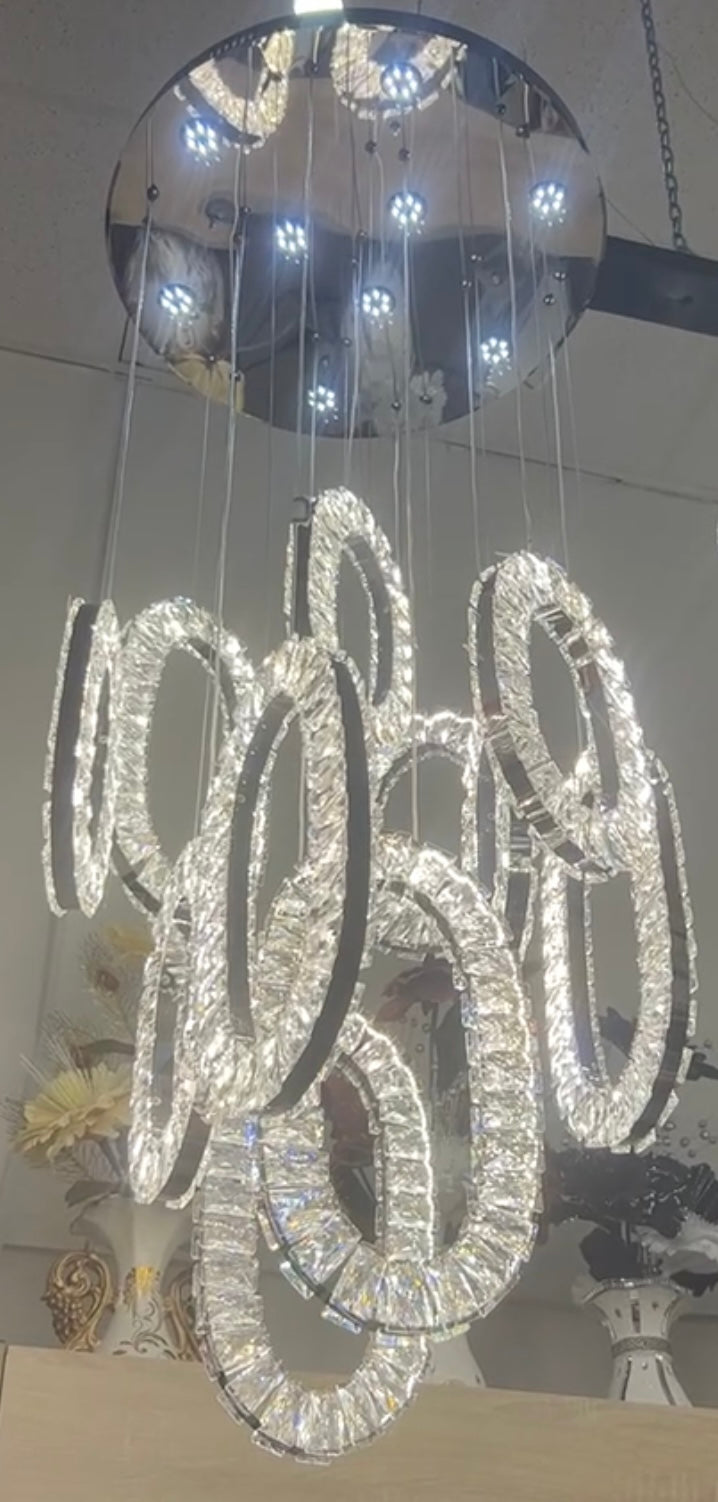 Ring style chandelier for open to above space