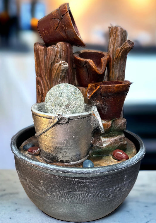 Log bucket style indoor fountain